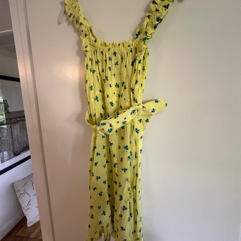 Vibrant Yellow Mini Dress with Blue Floral Design